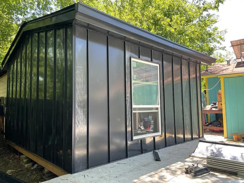 Black standing seam metal wall panels for Metal Roof Installation in Andrews